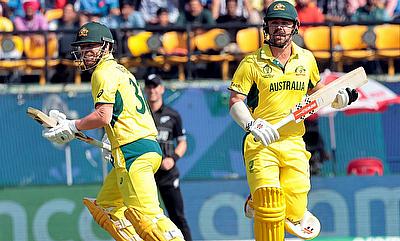 Australia's David Warner and Travis Head running between the wickets