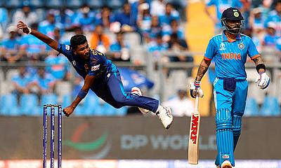 Sri Lanka's Dilshan Madushanka in action with India's Shubman Gill as Virat Kohli looks on alt=
