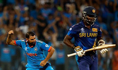 India's Mohammed Shami celebrates after taking the wicket of Sri Lanka's Angelo Mathews