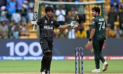 New Zealand's Rachin Ravindra celebrates after reaching his century alt=