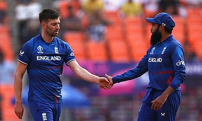 England's Mark Wood celebrates with Adil Rashid after the lbw wicket of Australia's Marnus Labuschagne alt=