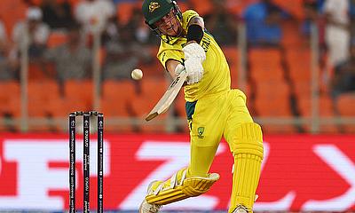Australia's Adam Zampa in action before losing his wicket, caught out by England's Jos Buttler off the bowling of Chris Woakes alt=