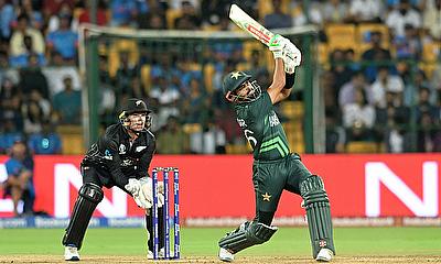 Pakistan's Babar Azam in action as he hits six runs alt=
