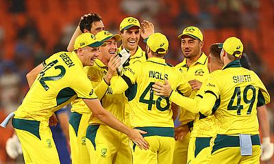 Australia's Mitchell Starc celebrates with teammates after taking the wicket of England's Jonny Bairstow alt=