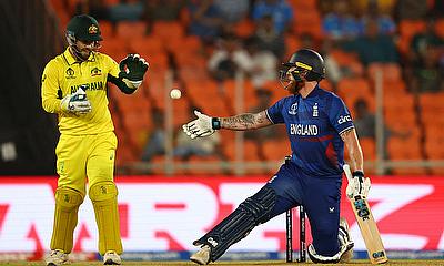 England's Ben Stokes gives the ball to Australia's Josh Inglis alt=