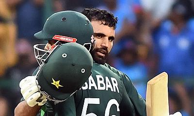 Pakistan's Fakhar Zaman celebrates after scoring a century alt=