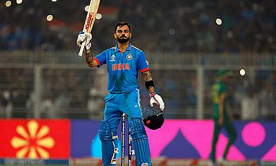 Virat Kohli celebrates after reaching his 49th century, equalizing with Sachin Tendulkar's record of most number of ODI centuries alt=