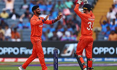 Netherlands' Aryan Dutt celebrates with Scott Edwards after taking the wicket of England's Jonny Bairstow, caught out by Paul van Meekeren alt=