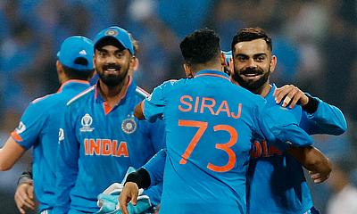IndiIndia's Virat Kohli celebrates with Mohammed Siraj after winning the matcha's Virat Kohli celebrates with Mohammed Siraj after winning the match