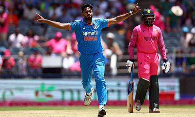 India's Avesh Khan celebrates with Axar Patel after taking the wicket of South Africa's David Miller