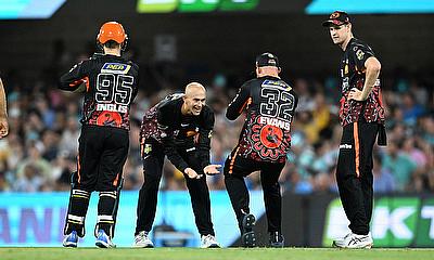 Ashton Agar (centre) of the Scorchers celebrates with team mates