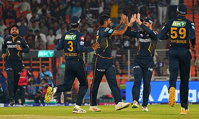 Gujarat Titans' Umesh Yadav celebrates