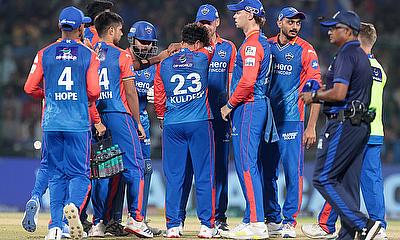 Delhi Capitals players celebrate the wicket of Gujarat Titans' Wriddhiman Saha