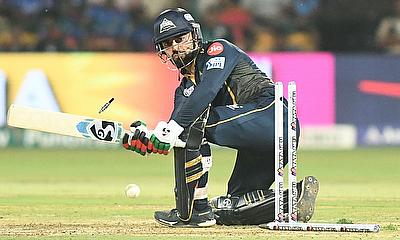 Gujarat Titans' Rashid Khan is bowled out during the IPL alt=