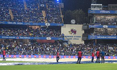 Grounds men cover the field as rain disrupts the IPL alt=