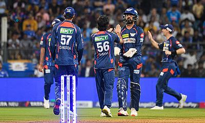 Lucknow Super Giants' Ravi Bishnoi celebrates the dismissal of Mumbai Indians' Rohit Sharma alt=