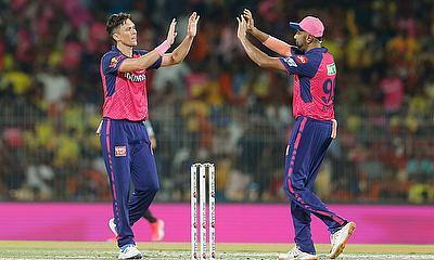 Rajasthan Royals' Trent Boult celebrates with teammate Ravichandran Ashwin alt=