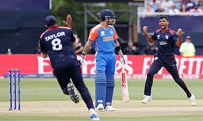 United States' Saurabh Nethralvakar celebrates after taking the wicket of India's Virat Kohli alt=