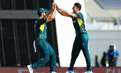 Australia's Pat Cummins and Mitchell Marsh celebrate