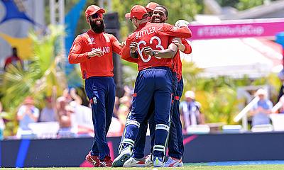 England's Chris Jordan celebrates with teammates after getting a hat-trick alt=