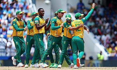 South Africa players celebrate after Quinton de Kock ran out India's Axar Patel alt=