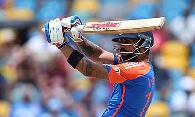 India's Virat Kohli hits a four alt=
