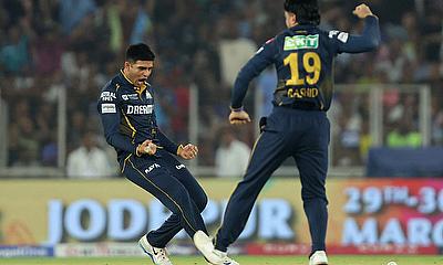 Gujarat Titans' Shubman Gill reacts after the lbw wicket of Mumbai Indians' Tilak Varma before it is overturned after DRS review alt=