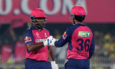 Rajasthan Royals' Sanju Samson and Nitish Rana bump fists during their innings alt=