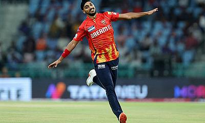 Punjab Kings' Arshdeep Singh celebrates after taking the wicket of Lucknow Super Giants' Mitchell Marsh alt=