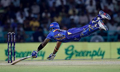 Mumbai Indians' Suryakumar Yadav dives to make a run alt=