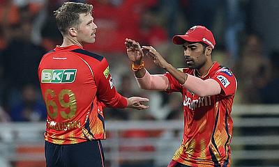 Punjab Kings' Lockie Ferguson celebrates with Shashank Singh after taking the wicket of Rajasthan Royals' Yashasvi Jaiswal alt=