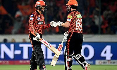 Sunrisers Hyderabad's Abhishek Sharma and Travis Head bump fists during their innings alt=