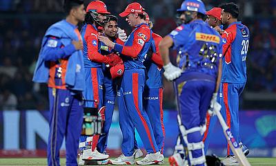Delhi Capitals' Vipraj Nigam celebrates with teammates after taking the wicket of Mumbai Indians' Rohit Sharma alt=