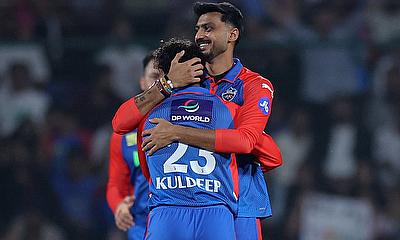Delhi Capitals' Kuldeep Yadav celebrates with Axar Patel after taking the wicket of Mumbai Indians' Ryan Rickelton alt=