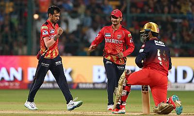 Punjab Kings' Yuzvendra Chahal celebrates the wicket of Royal Challengers Bengaluru's Jitesh Sharma alt=