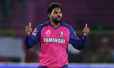 Rajasthan Royals' Wanindu Hasaranga celebrates after taking the wicket of Lucknow Super Giants' Aiden Markram, caught out by Riyan Parag alt=