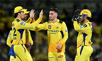Chennai Super Kings' Noor Ahmad celebrates with teammates after taking the wicket of Punjab Kings' Prabhsimran Singh, caught out by Dewald Brevis alt=