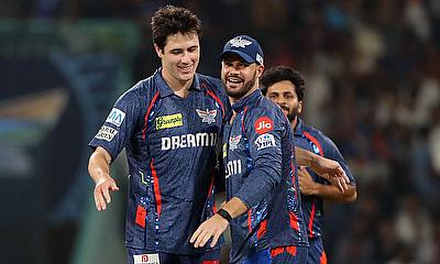 Lucknow Super Giants' William O Rourke celebrates with Aiden Markram after taking the wicket of Sunrisers Hyderabad's Atharva Taide alt=