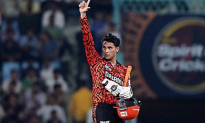 Sunrisers Hyderabad's Abhishek Sharma celebrates after reaching his half century alt=
