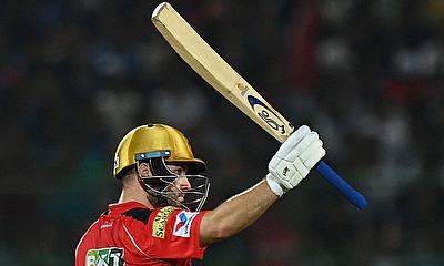 Punjab Kings' Josh Inglis celebrates after reaching his half century