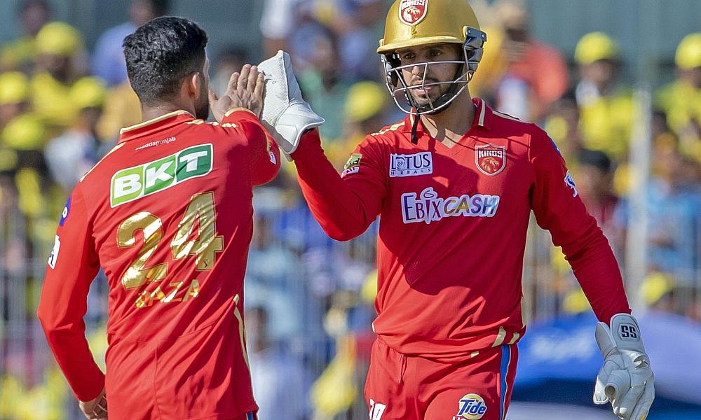 PBKS' Sikandar Raza with teammate Jitesh Sharma celebrate