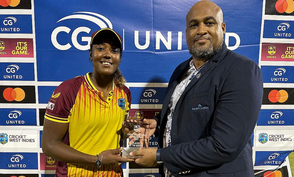 Marketing Manager Mgr of Caribcation Christopher Gustave with Player of the Match Hayley Williams Marketing Manager Mgr of Caribcation Christopher Gustave with Player of the Match Hayley Williams