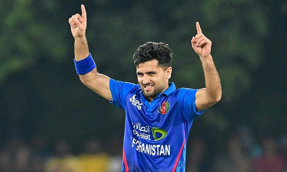 Afghanistan's Fazalhaq Farooqi took three more wickets to set up his team's T20 World Cup victory over Papua New Guinea Afghanistan's Fazalhaq Farooqi took three more wickets to set up his team's T20 World Cup victory over Papua New Guinea