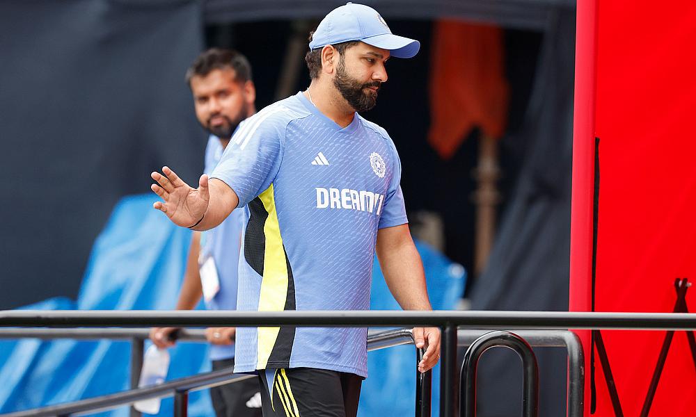 India's captain Rohit Sharma waves to a fan after match between India and Canada was abandoned India's captain Rohit Sharma