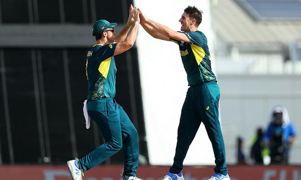 Australia's Pat Cummins and Mitchell Marsh celebrate Australia's Pat Cummins and Mitchell Marsh celebrate